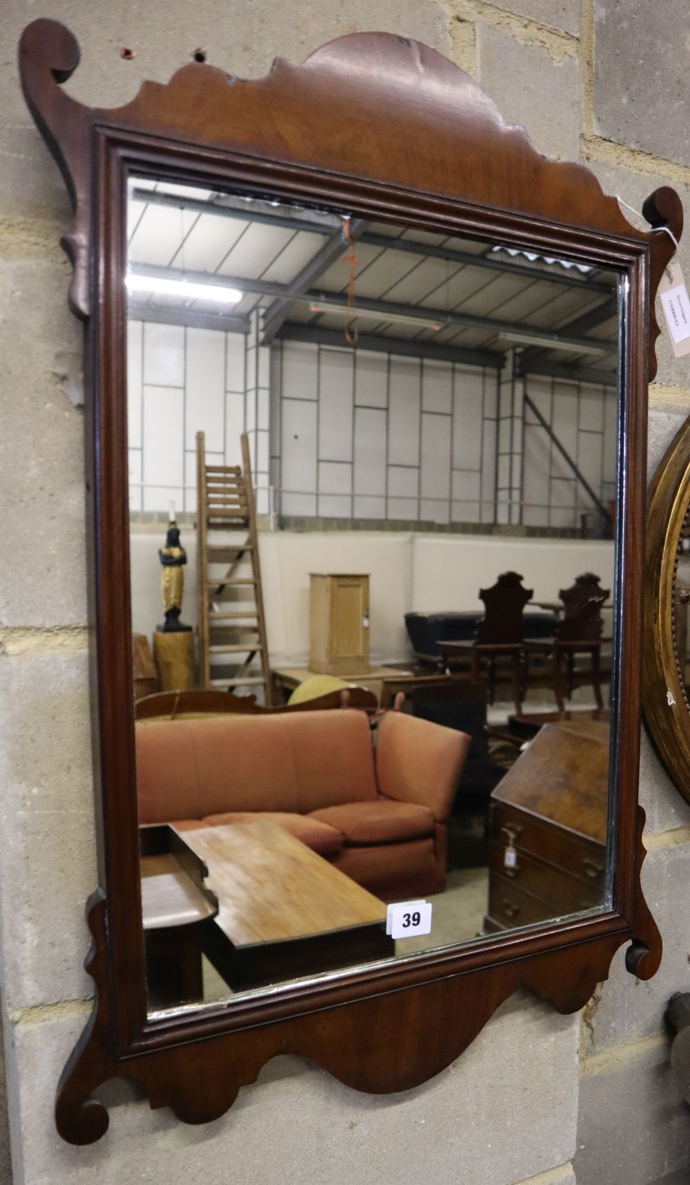 A George III style fret frame wall mirror, 49 x 73cm